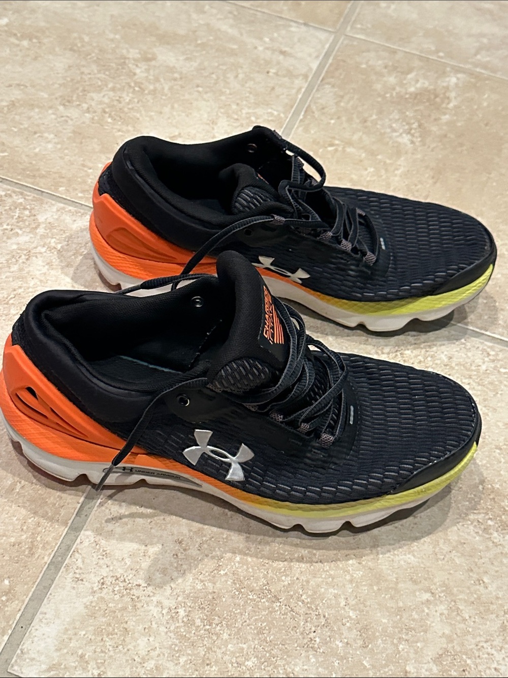 Under Armour Men's Black Running Shoes with Orange & Neon Yellow Accents